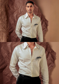 Man wearing HORD The Round About White ivory shirt with embroidered spider motif, full body and detail collage