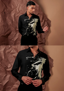 Close-up of HORD Iconic Paint Ball shirt showing metallic gold splatter on black