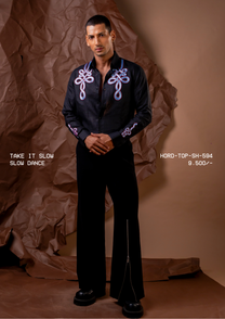 Man wearing HORD Slow Dance charcoal black shirt with lilac cord-knot embroidery, full-length studio shot