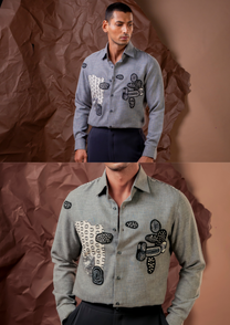Close-up of HORD Rafu shirt showing hand-stitched kantha patches and monochrome print on grey