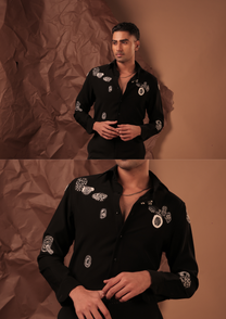 Close-up of HORD Ministry of Masala shirt showing ivory kantha and beaded motifs on black