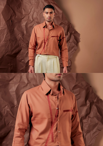 Man wearing HORD Crime Scene terracotta shirt with maroon tape line pocket flap, full body and detail collage