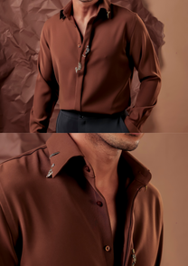 Close-up of HORD Animal Instinct brown shirt showing silver motifs on collar and placket