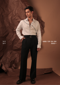 Man wearing HORD 3/7 pale grey shirt with diagonal navy zigzag embroidered line, full-length studio shot