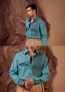 Close-up of HORD Meshmerize Panel Cobalt shirt showing check panel, multicolour woven patch and check cuff
