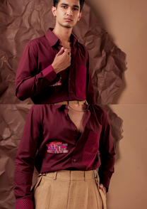 Close-up of HORD Meshmerize Panel Maroon shirt showing tonal panel, woven patch and striped cuff