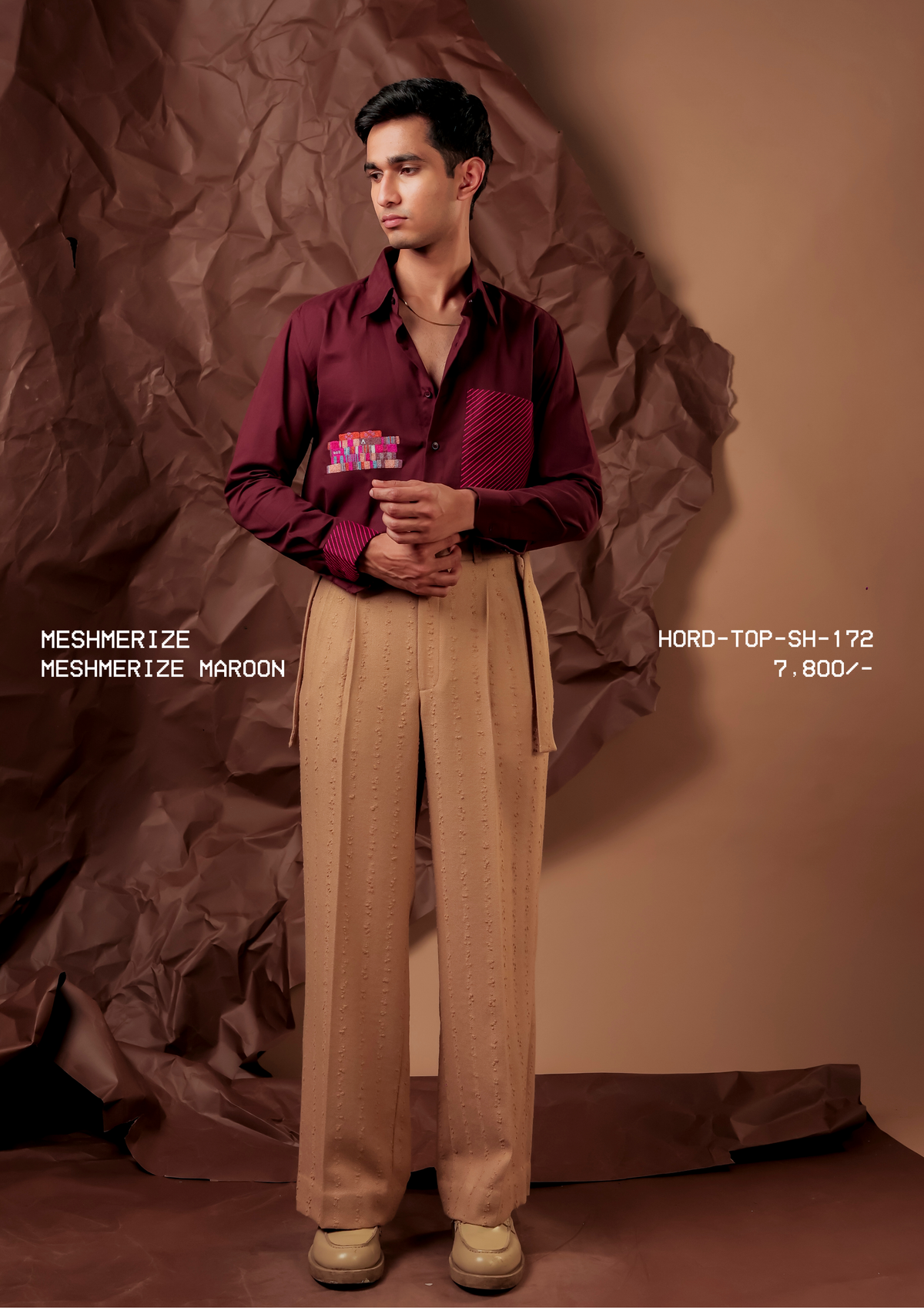 Man wearing HORD Meshmerize Panel shirt in Maroon with tonal check panel and woven chest patch, styled with beige trousers