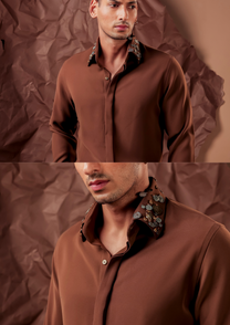 Close-up of HORD Buttalion shirt collar covered in clustered antique metal buttons