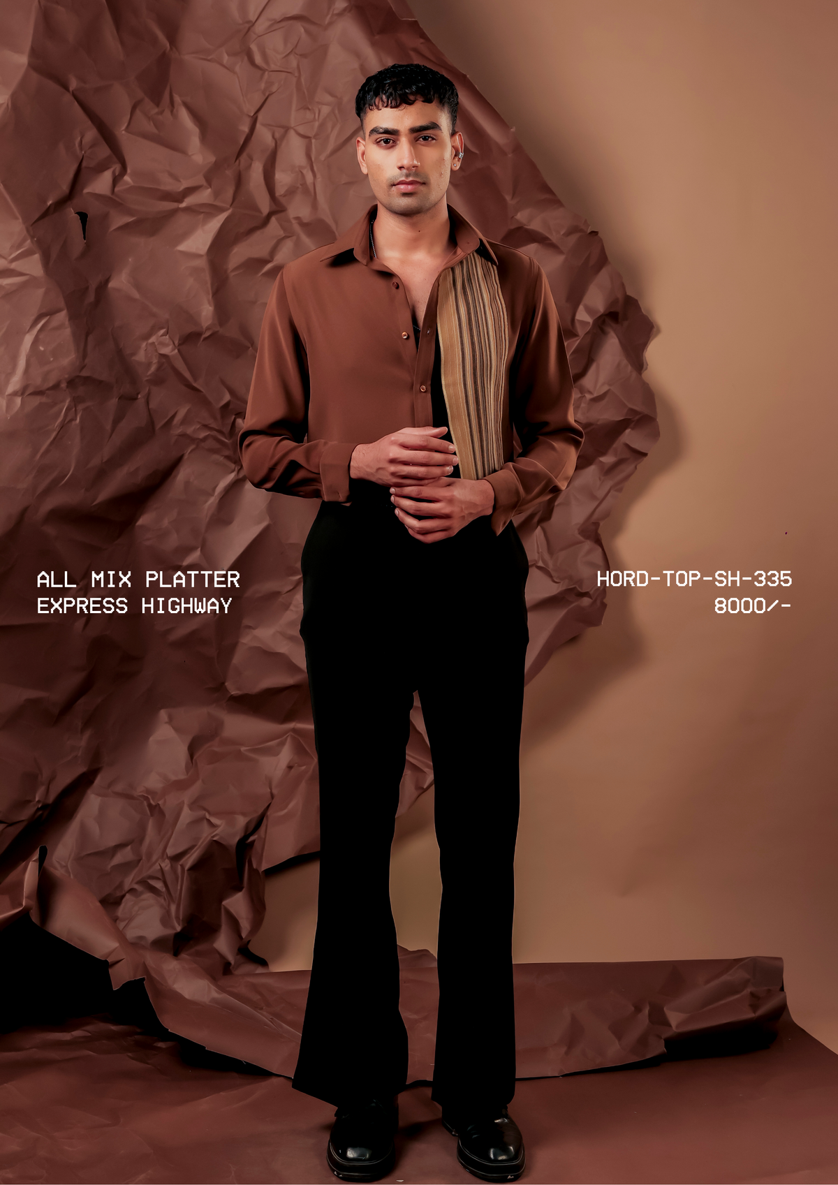 Man wearing HORD Express Highway rust shirt with vertical striped front panel, full-length studio shot