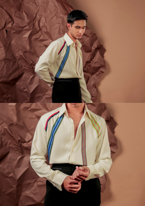 Man wearing HORD Fox ivory shirt with multicolor diagonal ribbon appliques on both shoulders, full body and detail collage