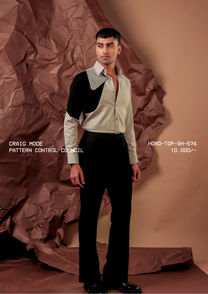 Man wearing HORD Pattern Control Council sage and black colour-block shirt with grid-check collar yoke, full-length studio shot