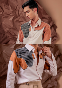 Close-up of HORD Department of Curves shirt showing curved rust panels, black piping and grid-check yoke