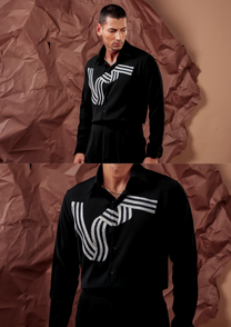 Close-up of HORD Tape In Motion shirt showing ivory tape stripes folding across black chest