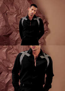 Close-up of HORD Almost Synthetic Black shirt showing crossed ivory tape stripes on black shoulders
