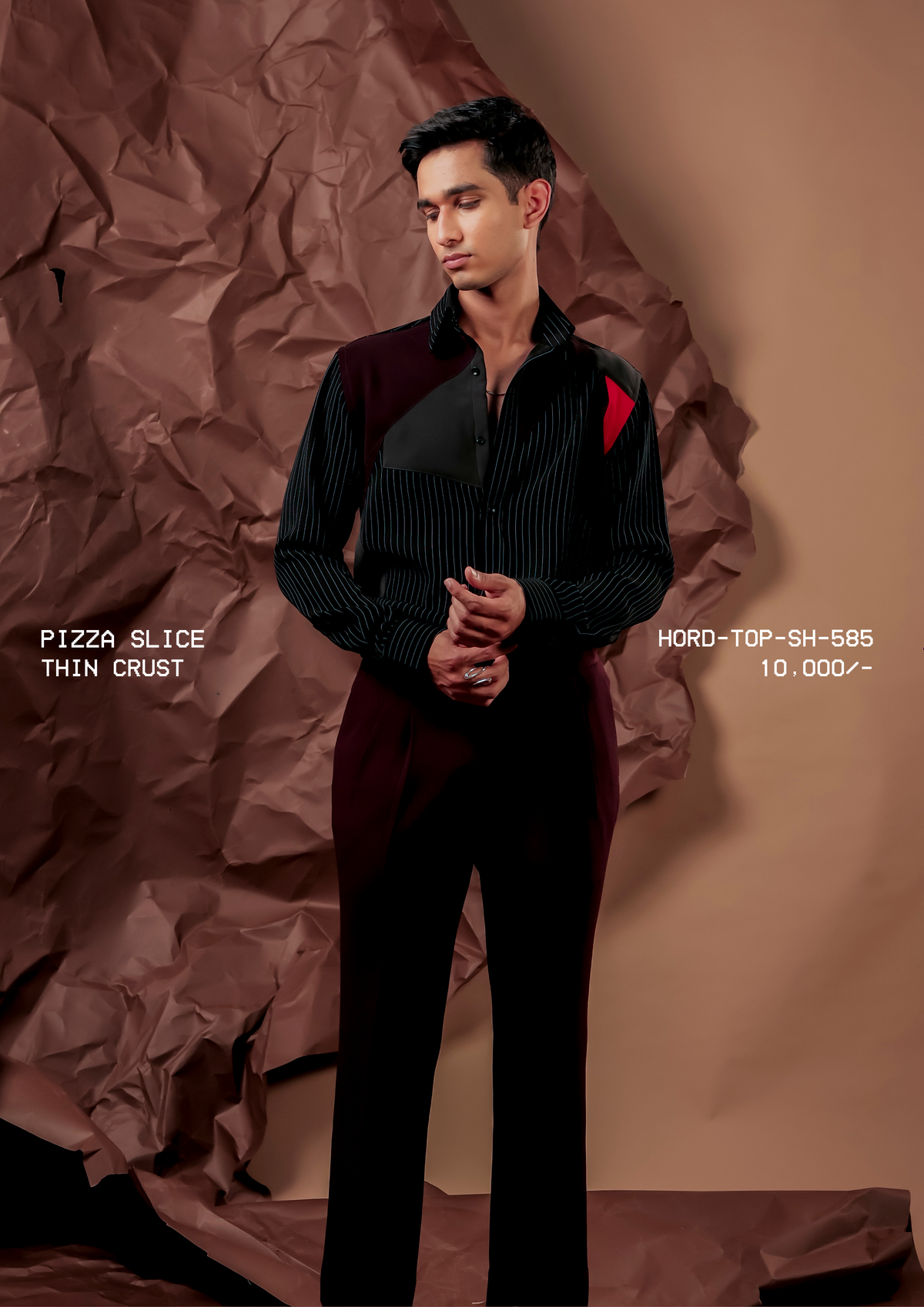 Man wearing HORD Thin Crust black pinstripe shirt with burgundy panel and red shoulder accent, full-length studio shot