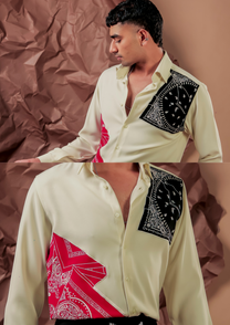 Close-up of HORD Crumbl shirt showing black paisley bandana shoulder panel and red bandana hem panel