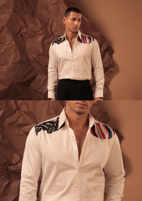 Man wearing HORD Warped Slvs white shirt with black leaf print and multicolor striped shoulder panel, full body and detail collage